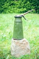 oilcan in nature photo