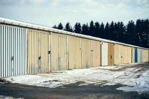 A row of old garages photo