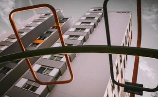 a high-rise with climbing frame with a view from below photo