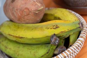 bananas in a wooden basket photo