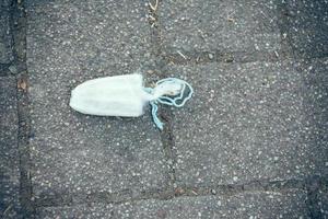 an old tampon on a street photo