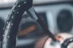 an old car steering wheel in close-up photo