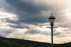 Streetlamp in nature photo