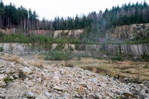 Quarry with forest photo