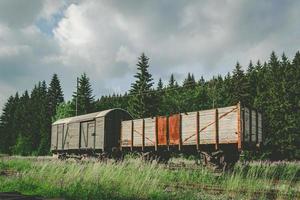 two old freight cars on a railway photo