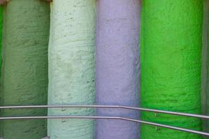 colorful stone columns with railing photo