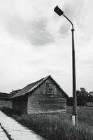 Wooden house in black and white photo