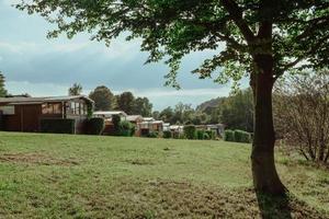 some bungalows in nature photo