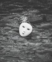 mask on a wall photo