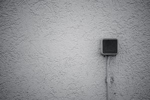 a light switch on a wall photo