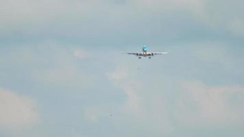Front view of jet airplane approaching before landing at Airport of Amsterdam AMS. Aviation and travel concept video