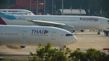 PHUKET, THAILAND NOVEMBER 28, 2016 - Thai airways Boeing 777 HS TKQ taxiing before departure Phuket airport. video