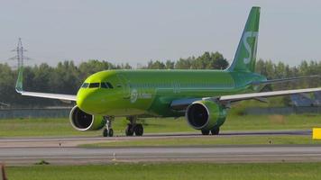 NOVOSIBIRSK, RUSSIAN FEDERATION JUNY 12, 2022 - Passenger Airbus of S7 Airlines on the runway at Tomachevo Airport, Novosibirsk. Tourism and aviation concept video