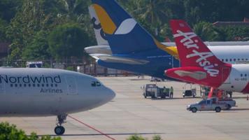 PHUKET, THAILAND NOVEMBER 29, 2019 - NordWind Airbus A330 VP BUB taxiing after landing on the Phuket airport. Mai Khao beach video