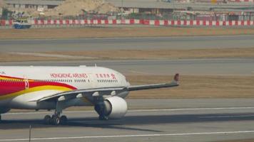 HONG KONG NOVEMBER 10, 2019 - Hongkong Airlines Airbus A330, B LNE departure from Chek Lap Kok International Airport. Air Flight from Hong Kong video