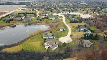 Aerial view The village of Mundelein in Illinois is near Chicago in the United States. Park and lakes around houses. Beautiful landscape of the village and the lake. A cozy place in America.