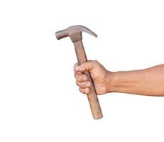 A man holding an old and rusty hammer isolated photo