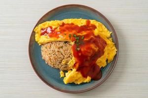 Flavored Fried Rice in an Omelet Wrapping photo