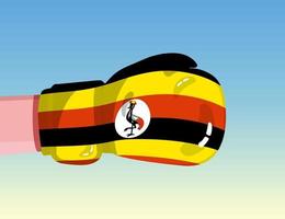 Flag of Uganda on boxing glove. Confrontation between countries with competitive power. Offensive attitude. Separation of power. Template ready design. vector