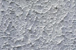 textura de pared de cemento áspero blanco. foto