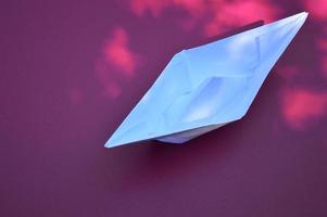 Folded paper boat photo