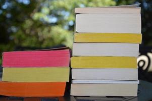 Few books on the garden table photo