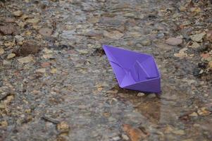 Folded paper boat photo