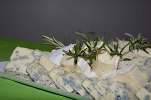 Cheese decorated with rosemary photo