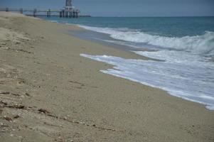Beach waves and sand photo