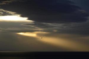 Sunset and Stormy clouds photo