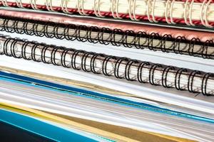 Stacked of office documents paper in the black background photo