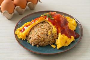 Flavored Fried Rice in an Omelet Wrapping photo