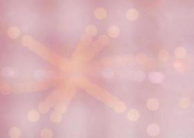 Abstract blurred beautiful light with soft pink bokeh and sparkle photo