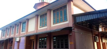 Masjid Batu 8 is a simple mosque in terms of construction with a brown color photo