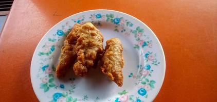 fried bananas are on a plate photo