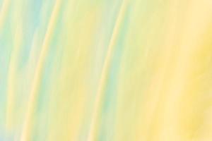 Mint yellow abstract background with gently blurred diagonal lines waves. photo