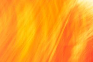 Orange yellow background with scuffs and scratches, Bright abstraction photo