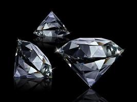 Dazzling diamond on black background photo