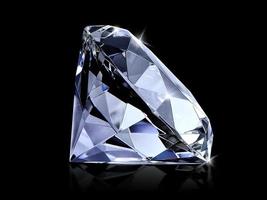 Dazzling diamond on black background photo