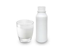 Glass of milk and milk bottle isolated on white background photo