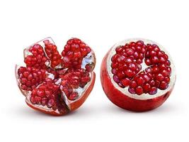 Juicy pomegranate fruit isolated on white background photo