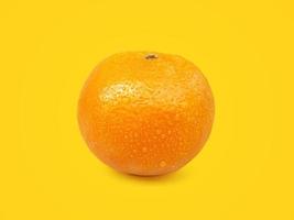 Orange fruit on orange background photo