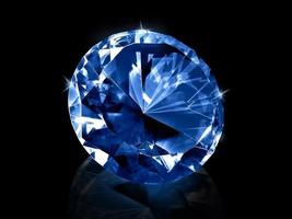 Dazzling diamond Blue gemstones on black background photo