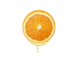 Fresh orange juice dripping isolated on white background. Clipping path photo