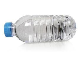 Empty clean and clear water bottle isolated on with isolated on a white background photo