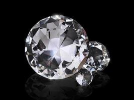 Dazzling diamond on black background photo