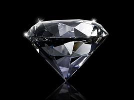 Dazzling diamond on black background photo