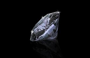 Dazzling diamond on black background photo