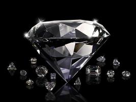 Dazzling diamond on black background photo