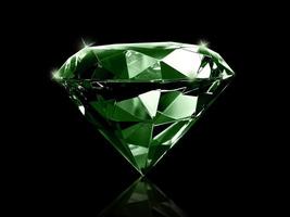 Dazzling diamond Green gemstones on black background photo